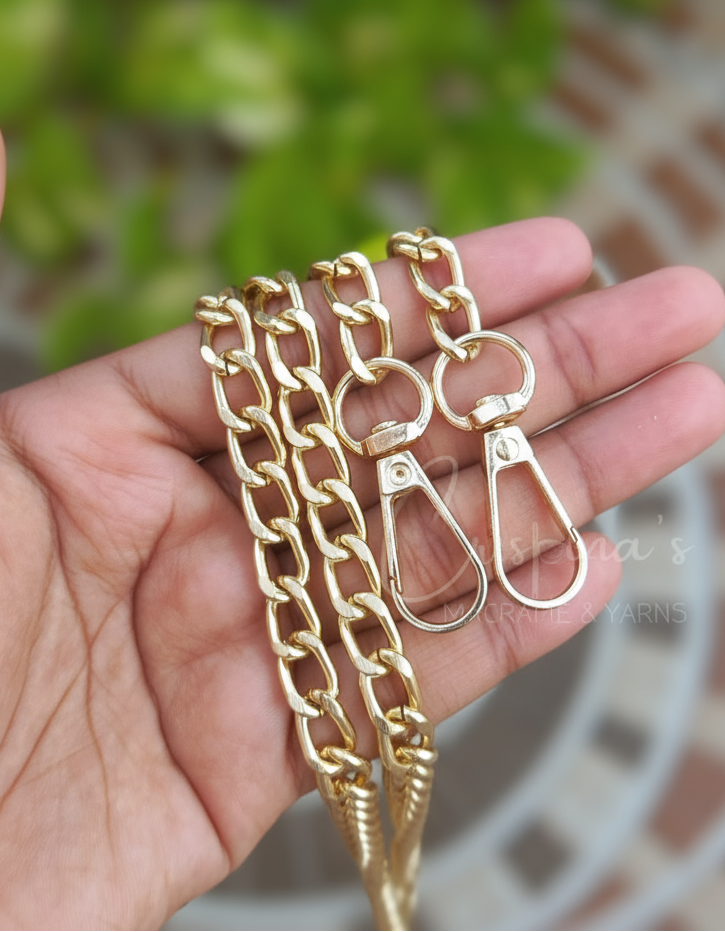 Gold bag chain with hook held in a hand, labeled 'Anti-Tarnish Medium Bag Chain with Hook'.