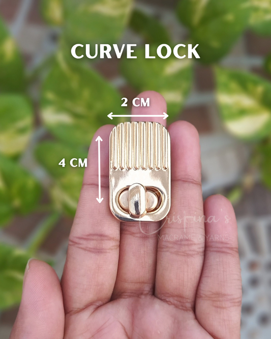 Curve lock for handbag and purse